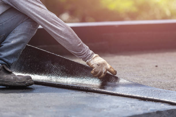 Professional Basement Waterproofing technician working in Springfield, MI
